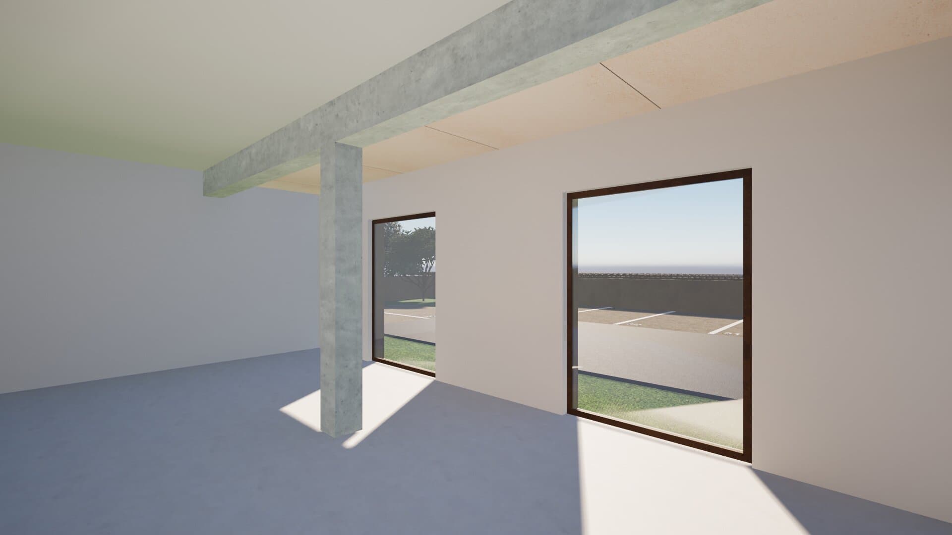 Plateau brut : structure poteau-poutre en béton et deux grandes baies